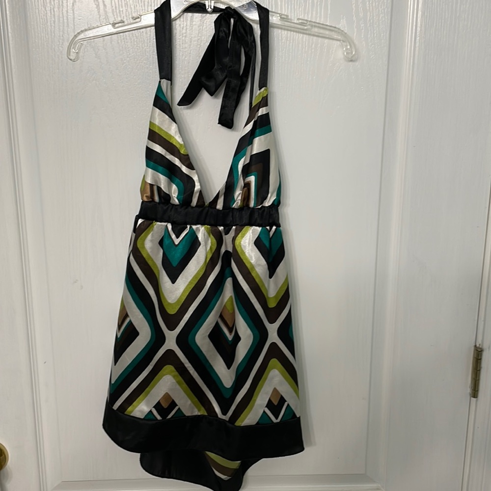Halter top. Colorful. Soft. Ties around the neck and in the back.